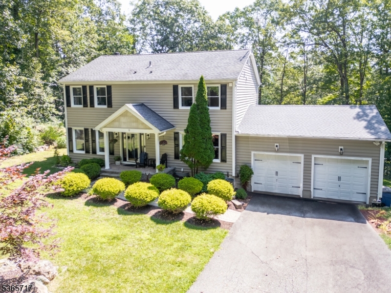 This home is located on a dead-end road in Hopatcong, NJ, providing a private setting. The exterior features a newly painted deck just off of the kitchen, a beautifully landscaped yard of 0.43 acres, and a large fenced-in above-ground pool with a wrap-around deck, offering the perfect space to enjoy the outdoors. Upon entering the home, you'll notice the hardwood floors throughout most of the first floor. Each bedroom has brand-new carpeting, and every bathroom has been thoughtfully remodeled with updated finishes. Additional features include a 2-car garage with a new roof, a full walkout basement with excellent potential for finishing, new windows throughout, and a recently upgraded 3 Bedroom Town Verified Septic system with a new Distribution Box. Smart features can be found throughout the home, such as programmable thermostats and a Bluetooth speaker/fan in each of the full bathrooms, adding convenience and modern touches. This home is move-in ready and offers a thoughtful combination of updated living spaces, a well-maintained yard, and a desirable location.