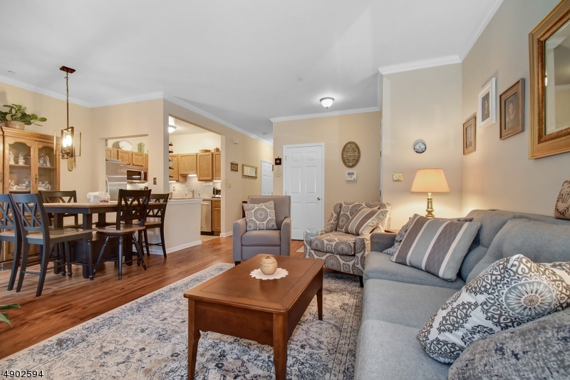 Fantastic move-in ready end unit in conveniently located Cambridge Heights.  2 Bedrooms & 2 full Baths.  Newer kitchen with stainless appliances, laminate floors in Kit, LR & DR along with new carpets in BR's. Sliders off DR to Patio.  Master BR with 2 closets and full bath.  New Washer/Dryer and newly installed Honeywell Smart Thermostat, Security System & light fixtures.  Close to major highways, shopping and public transportation.  Pet friendly and right next to clubhouse & pool.  Just pack your bags!
