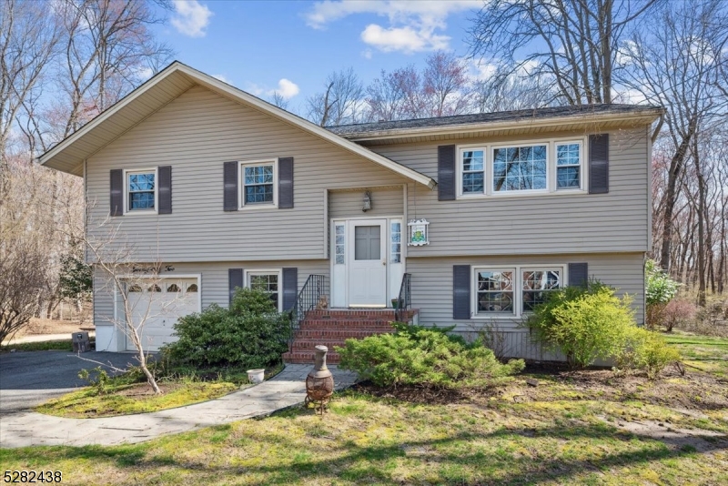 Highest and Best offers extended to 5/9/2024 as many missed the instructions in offer guidelines. BACK ON MARKET - First time on the market! Lovingly cared for 4-bedroom home has is just what you have been waiting for. Main level boasts hardwood floors, lots of natural light, kitchen, living room, dining room, three generously sized bedrooms and a full bath. Sliding doors off the dining room leads to an oversized deck to sit and enjoy the birds and local wildlife. A lovely pond sits at the back of the property which was dug when the house was built, and walking trails weave through the beautiful wooded lot. Lower level offers an additional bedroom and family room, full bath, laundry room and oversized garage. Additional sliding doors lead to ground floor covered patio. Lincoln Park has a bustling downtown with lots of shopping, restaurants and things to do.Dont wait this one wont last. Last time property had water was hurricane Irene. Attached is the elevation certificate and a verified flood insurance quote.