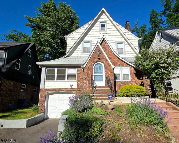 Nestled in the sought-after Upper Gregory neighborhood, this well-maintained Tudor offers character, comfort, and exciting potential. Enjoy convenient access to schools, parks, and the free Jitney service to the South Orange NJ Transit station. Inside, you'll find a spacious living room anchored by a charming fireplace, a large dining room for gatherings, an all-season den, breakfast area, and powder room. The second floor features three bedrooms and a full bath with both a separate shower and tub. The expansive walk-up attic presents endless possibilities create a primary suite, home office, guest space, or additional living area to suit your needs. Additional highlights include a brand-new indoor oil tank installed in May 2026. A wonderful opportunity to own a timeless Tudor and make it your own in one of the area's most desirable neighborhoods. Fireplace, grill, and gas line connection are being sold as-is. Fireplace and chimney inspections are for informational purposes only. Professional pictures coming on 6/5/26.