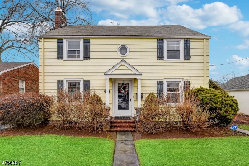 Welcome home! This magnificent home has been well maintained, full of original charm, great energy, and positive vibes. Upon entering, gleaming hardwood floors invite you through this "Sunshine" filled home. Holidays are cheerful in front of the natural wood burning fireplace in the expansive living room. You will enjoy cooking in the large eat in kitchen, leading out to a nice sized deck. Enjoy reading a book or relaxing in the Sun filled 3 seasons room. Upstairs, you will find oversized bedrooms, and a large full bath with lots of potential. Backyard with deck is perfect for entertaining or gardening. Plenty of room for storage in the full basement, walk up attic, detached garage or storage shed. Great "Sunnyside" location! Priced to sell! Don't miss this fantastic opportunity!