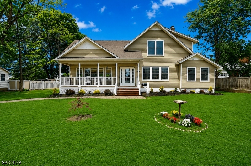 Charming Colonial in desirable Pompton Lakes offering classic curb appeal, a welcoming front porch, and a beautiful oversized property with an inviting built-in swimming pool featuring a brand-new liner. The interior offers 3 bedrooms and 2 full bathrooms with a warm, open-concept layout designed for comfortable everyday living and entertaining. The first level features Brazilian hardwood floors, a formal living room with a wood-burning fireplace, and a spacious eat-in kitchen that flows nicely into the main living areas. A standout feature of the home is the gorgeous family room filled with natural light, offering walls of windows, cathedral ceilings, two skylights, and sliding glass doors leading to the deck and backyard. Enjoy outdoor living with plenty of yard space, a pool, deck, and room to relax or entertain. Conveniently located near downtown Pompton Lakes shops, restaurants, public transportation, and major commuting routes. A wonderful opportunity to own a charming home with space, character, and a fantastic backyard setting.