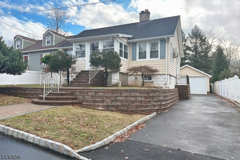 Welcome to this Charming Cape Cod in Desirable West Orange.  This cozy 3-bedroom, 1-bath home with boundless potential, nestled in a sought-after neighborhood in West Orange. This home boasts a newer roof, boiler, and windows. The main floor features a wood-burning fireplace for cozy evenings, and a finished, enclosed front porch perfect for relaxing.  Outside you'll love the patio and shed for extra storage. The oversized 600+ square foot two-car garage, equipped with electricity and a gas line for heating, is a standout feature, offering endless possibilities for a workshop, studio, or additional storage.  Conveniently located near major highways, shopping, Eagle Rock Reservation, the high school, and nearby country clubs, this home offers accessibility and lifestyle.  With some updates, this home has the potential to truly shine. Don't miss this opportunity for great value, schedule your showing today!