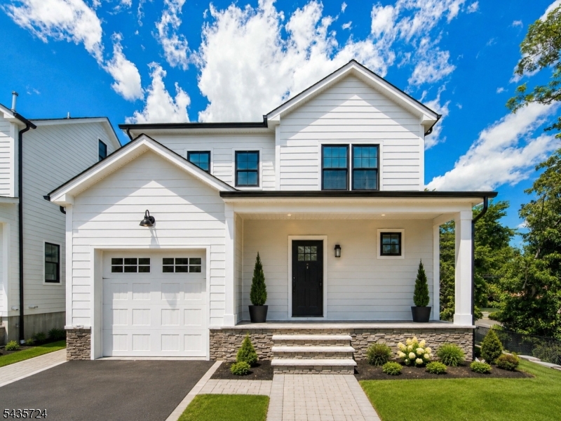 Experience the pinnacle of contemporary living in this stunning, brand-NEW construction townhouse, where sleek modern architecture meets unmatched convenience. This expansive residence features a sophisticated open-concept layout with 5 spacious bedrooms and 4.5 designer bathrooms, ensuring everyone enjoys their own private sanctuary. Home is situated within easy walking distance of Millburn's top-rated elementary and high schools, consistently ranked among the best in New Jersey. Commuting is a breeze with the Millburn Train Station just a walk away providing direct Midtown Direct service to NYC. Whether you are entertaining in the gourmet kitchen with huge center island with waterfall countertops, subway tile backsplash and top of the line appliances open to family room with 5' linear gas fireplace or enjoying the light-filled living spaces. Beautifully finished Lower Level with recreation room, office and full bath. This home represents a rare opportunity to secure a turnkey property in a premier, highly walkable neighborhood known for its world-class education and effortless city access. Builder warranty to ensure peace of mind!