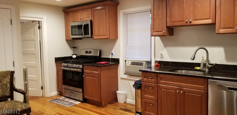 TOTALLY RENOVATED APARTMENT IN DESIRABLE WHARTON SECTION!  HARDWOOD FLOORS, EAT-IN KITCHEN W/ GRANITE COUNTERS, STAINLESS STEEL APPLIANCES, WASHER AND DRYER INCLUDED! AMPLE PARKING PLUS OUTDOOR SPACE!  PERFECT LOCATION FOR COMMUTERS, NEAR 80, 46, 15, TRAIN STATION AND BUS SERVICES. TENANT APPLICATION PROCESS APPLIES, TENANT TO OBTAIN RENTER'S INSURANCE. PETS ON A CASE BY CASE BASIS.