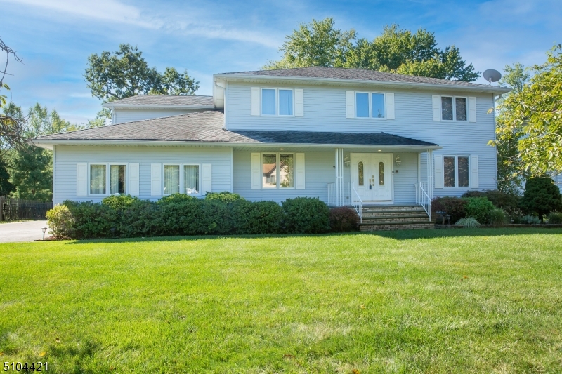 Spacious colonial with open floor plan in fantastic neighborhood.  Huge plus is first floor potential in law suite or home office with separate entrance. Oversized rooms with tons of storage. Finished full basement with full bath, family/game room as well as a separate bonus room with closet. Multi zone heat and 2 zone A/C. Owner has not used underground sprinkler or intercom and says security system is just disconnected and new owner can reconnect. Large asphalt driveway just recently newly paved and garage doors are only 3 years old.