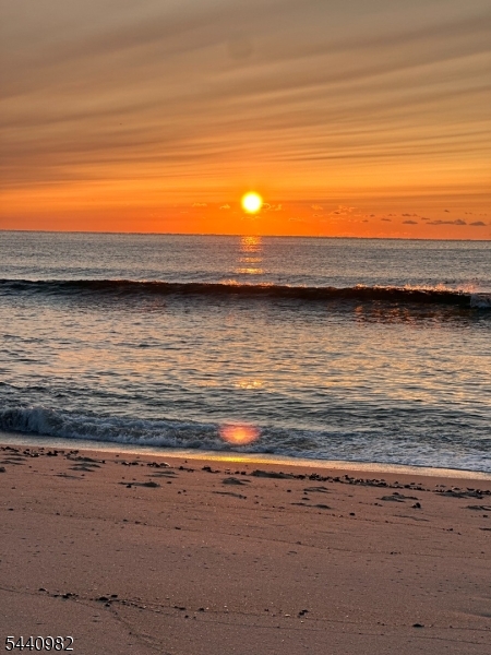 This one-of-a-kind, first-floor condominium in the desirable Bayhead By The Sea complex in Point Pleasant Beach, NJ 1 block from the beach!This completely renovated unit boasts a bright, open floor plan with a custom-updated kitchen and bathroom, plus a spacious, airy living room that fills with natural light.Some Recent 2024 upgrades include:Refinished hardwood floors,New dishwasher, microwave, and refrigerator.New LG washer/dryer stack system New interior doors and hardwareNew hugger-style ceiling fans,New bedroom closet doors and tracks Added recessed lighting in the kitchen,NEW AZEK CUSTOM SHELVING AND WAINSCOTTING IN OFFICE/LAUNDRY AREA,NEW KITCHEN FAUCET NEW BATHROOM TOILET AND FAUCET,INSTALLED NEW INSULATED ALUMINUM CLAD ENTRANCE & STORM DOOR W/KEYLESS REMOTE TOTAL REPLACEMENT OF EXTERIOR SLEEVES FOR AC CRUST & CORROSION REPLACeMENT NEW HEATER FAN INSTALLATION IN BATH SHOWER COMPLETED INTERIOR FRESHLY PAINTED, Enjoy resort-style amenities right in the complex: in-ground built-in pool, barbecue area, , assigned parking, and beautifully maintained landscaping.Prime location puts you conveniently close to the train station, local restaurants, in-town shopping, marinas, the boardwalk, amusement rides, and endless Jersey Shore attractions.Heat, water, flood insurance & sewer included in monthly maintenance fee. Don't miss this rare opportunity to own a turnkey beachside gem perfect for year-round living or a coastal getaway!