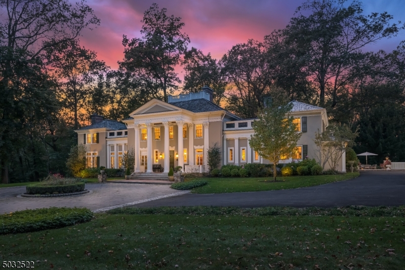 "Woodedge" is a rare opportunity to own a beautifully restored and modernized George B. Post residence. Privately set on 8+ bucolic acres, amid expansive parklike grounds and towering boxwoods. The columned exterior belies its relaxed interior, as one room opens to another for an easy flow when entertaining. Highlights include: a stunning kitchen with a large center island, state-of-the-art appliances, adjoining butlers pantry, mahogany doors, pine floors, three gorgeous fireplaces, glass-front cabinetry, transom-topped French doors and oversized windows.  A detached two-car stone garage & a rustic stone house are notable amenities. Originally an icehouse, the stone house is now a media room w/ Surround Sound. The residence has Cat 5 wiring, wireless high speed internet & Smart Home Technology