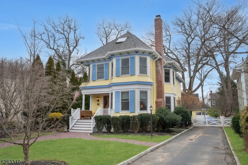 Northside victorian in the heart of downtown Summit boasting 5 BR and 3 1/2 baths. Large custom Kitchen with Laundry Room and  Pantry with access to covered Porch in rear level yard. The adjacent Family Room is separated from the Dining Room with original pocket doors. The Living Room has a  wood burning fireplace. A Vestibule, large front Hall, coat closed and a Powder Room complete the first floor.  The second floor is home to the Primary Bedroom suite with Bath and walk-in closet as well as 3 other Bedrooms and a full Bath. The fifth Bedroom and third Bath reside on the third floor together with a spacious game/leisure room.  Ample storage can be found in the unfinished basement.  Multi-zone heat and air conditioning. This property offers you a level yard on a quiet street minutes away from transportation, restaurants and stores in a top school district.