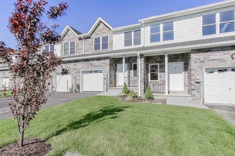 You will be impressed with this unit! Please remove shoes, hardwood floors throughout. Upgraded kitchen cabinets with granite counters and custom back splash, Recessed lighting, sliding glass doors to deck, backed by privacy! Three bedrooms upstairs with upgraded bathrooms. Epoxy painted basement and garage. Garage door opener. Great development close to shopping and highways but not too close.