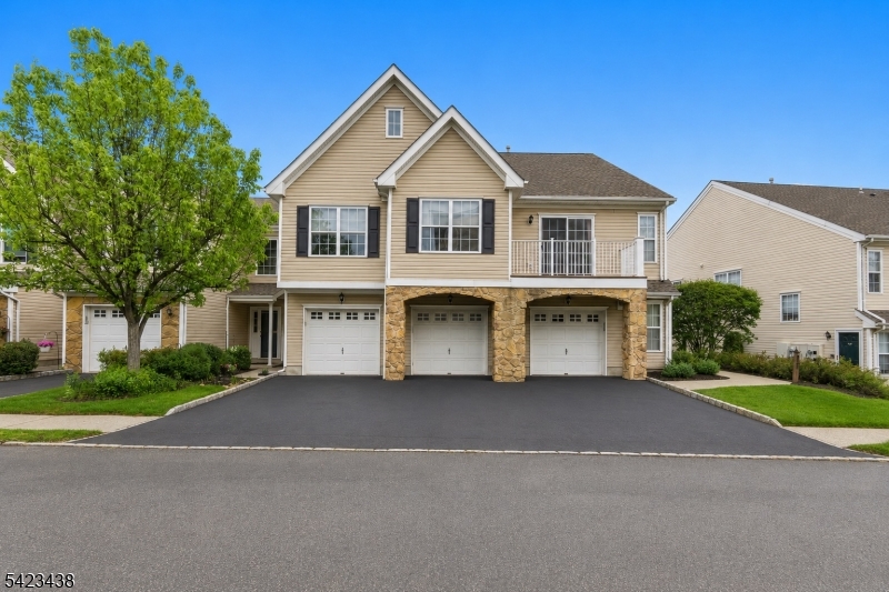 Welcome Home and to THE HIGHLANDS! This beautifully maintained 2/3 bedroom, 3.5-bath end-unit townhouse in The Highlands of Pompton Lakes offers the perfect blend of comfort, style, and versatility. Filled with natural light, the spacious main level features a sun-drenched living room with multiple windows, a cozy gas fireplace, and direct access to an east-facing deck ideal for enjoying peaceful sunrises. The adjacent dining area showcases custom built-in shelving with ample storage, while the updated kitchen is equipped with granite countertops, newer stainless steel appliances, generous cabinetry, and a pantry. A convenient half bath and a laundry room with direct garage access complete this level.Upstairs, the primary suite serves as a serene retreat with a walk-in closet and a well-appointed en-suite bath featuring a soaking tub and separate shower. A second bedroom and an updated full bathroom complete the upper level.The walkout lower level offers exceptional flexibility, featuring a renovated full bathroom, two large closets, and ample living space perfect for a home office, gym, entertainment area, or guest suite. With the potential to function as a third bedroom, this level adds tremendous value and versatility. Additional highlights include a newer HVAC system, making this home truly move-in ready.