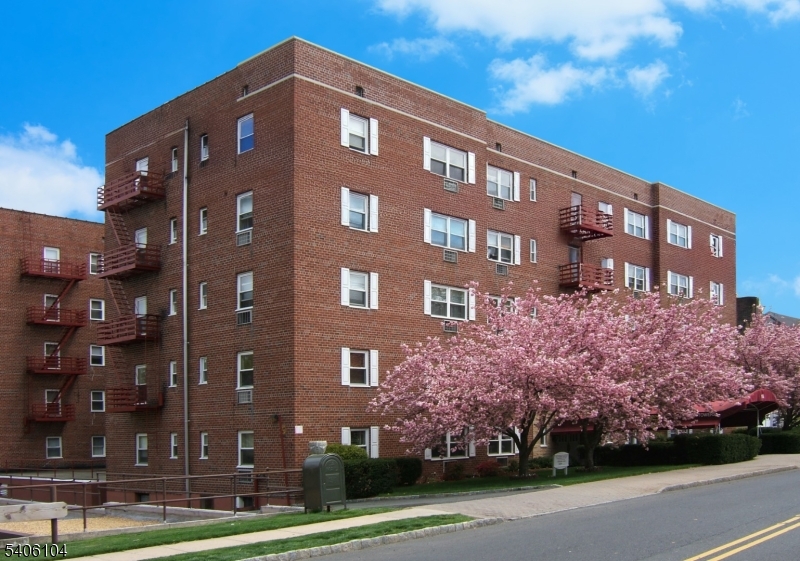 Welcome to Cranford Towers, Suite 4E This beautifully renovated two-bedroom, one-bath condominium overlooking the Rahway River is move-in ready! Step into a welcoming foyer and hallway with rich cherry hardwood floors. The spacious bedrooms and cozy living room feature plush wall-to-wall carpeting, while the kitchen and bath boast elegant ceramic tile. Freshly painted with neutral tones and new appliances, this home offers comfort and style in every corner. Don't miss this incredible opportunity! Rooms - Two Bedrooms, Bathroom, Kitchen, Foyer, Four Closets. Additional Storage - A secure storage area on the lower level. Parking - One assigned indoor parking space (tandem) and bicycle storage are included. Smoking - Cranford Towers is a non-smoking building. Smoking is not permitted in the individual condominium units, common areas, or anywhere on the premises. NOTE: The information provided is believed to be accurate and reliable. However, no warranties, expressed or implied, are made regarding its completeness, accuracy, or reliability. It is the buyer?s responsibility to independently research all information before making any decisions or purchases.