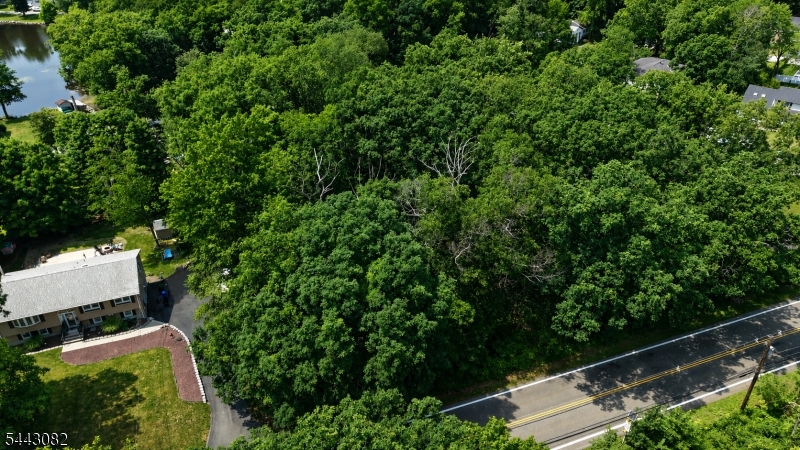 Opportunity to build in desirable Rockaway Township. This 0.48-acre (21,079  SF) lot is located in the R-13 Residential Zone and is zoned for single-family detached residential use. Based on zoning review, the property appears capable of supporting a substantial custom home, generally consistent with approximately 2,500"3,500 SF, subject to final design, setbacks, lot coverage, grading, utilities, permits, and all municipal approvals. Conveniently located near Rockaway Townsquare, The Cheesecake Factory, Chipotle, Cinnabon, Popeyes, Camp Hudsonia Fields, Egberts Lake Park, Farny State Park, Splitrock Reservoir, Katharine D. Malone Elementary School, Copeland Middle School, Morris Hills High School, Route 80, Route 15, and Route 46. Buyer responsible for all due diligence and verification of intended use, approvals, school assignment, utilities, and development feasibility. Please refer to the attached PDF for an illustration of the property's approximate boundaries and dimensions.