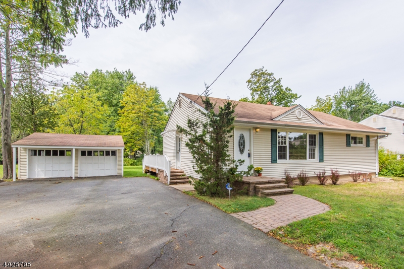 Dreaming of the perfect ranch home? Enjoy all the advantages of 1 floor living + a full finished bsmt. The amount of flexible living space is impressive. Lovely, private backyard & deck. Perfect for entertaining. Nearly an acre! Gleaming HW floors throughout. 3 comfortable bdrms including master w/ half bath. Lots of additional room to fit your lifestyle. Renovated kitchen w/ SS appliances, granite countertops, 42? cherry cabinets & stylish backsplash. Opens to combo dining/living area. Finished bsmt adds to its spaciousness & organization; complete w/ family room, full bath, storage room & laundry. Well maintained!! Central A/C & Natural Gas. 2 car garage, plenty of parking. Easy access to major highways, NYC-Direct mass transit, shopping, parks, town pool & top rated schools. MOVE RIGHT IN!