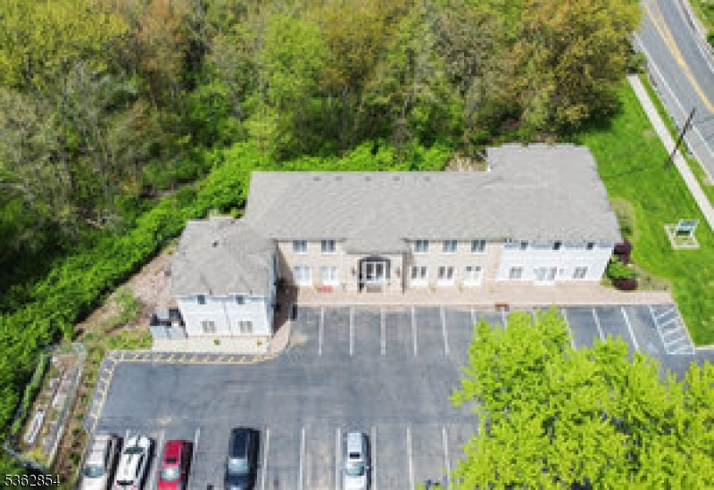 Suite 4 available in this professional office building in the desirable location of Warren Township.  Close to Dunellen train station and many shopping complexes.    Sq ft of Suite 4 is approximately 1679 sq ft. The grand updated foyer leads to the second floor suites and each area has tons of bright natural light and a lot of options of storage.  Half bathroom on the second floor along with an option of converting the utility room into a kitchenette.  There is a front and rear entrance and this building also boasts a large private parking lot with 30 spaces.