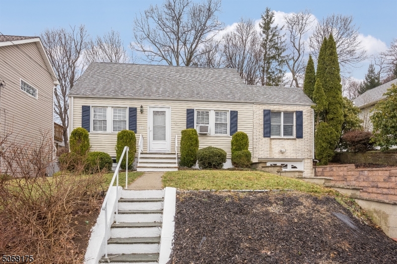 This ready to move-in freshly painted cape cod home features  2 Bedrooms with 2 full bath. 1st floor with an eat-in kitchen, living room, formal dining room, master bedroom and den. (Den can be used as 3rd bedroom). 2nd Floor offers a generous sized bedroom & sitting room. The partially finished basement provides extra living space with a family room.  Additional storage & laundry also. Screened in porch.  This home sits on a quiet cul-de-sac street.  A commuters dream just seconds from Rt 46 with easy access to Highways, Mins to NYC Direct train & bus.
