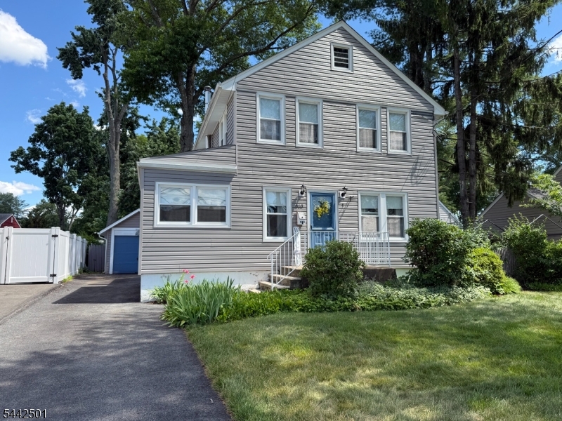 Welcome to this cute and cozy 3 bedroom, 1 1/2 bath Colonia located in beautiful Pompton Lakes! Fantastic opportunity for first-time homebuyers.  This charming home offers a warm and inviting layout, perfect for comfortable everyday living.  The first floor features a formal living room, dedicate office space, formal dining room, eat-in kitchen, and a convenient powder room.  The kitchen offers direct access to a spacious deck, overlooking a beautifully manicured and manageable backyard, ideal for relaxing, entertaining, or enjoying outdoor gatherings.   The second level features three bedrooms and a full bathroom.  A partially finished basement provides plenty of storage space and includes a laundry area for added convenience.  Additional highlights include hardwood floors, center air conditioning, a whole house generator, and a detached one car garage.  Conveniently located near shopping, restaurants & major highways.