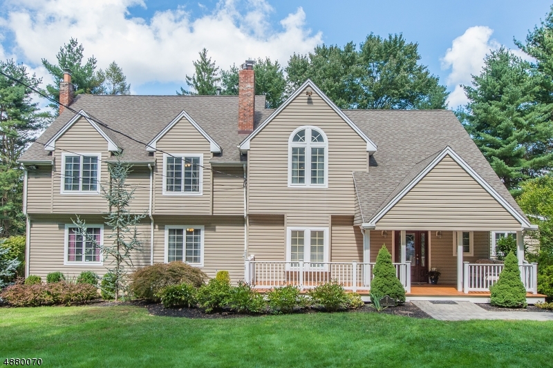 6+ bedrooms, over 3500 SF. HWD on main floor, Great Kitchen, Energy Star SS appliances, custom granite & back splash w/ a large center island, & separate eating area! Ceiling fans & newer mechanics, and Roof! 1st floor has Full bath & Powder rm. Liv, Dining, Kitchen & 3 large bedrooms. Upstairs, the Master Suite boasts cathedral ceilings, French doors, Palladian windows, huge Walk in closet, Sitting area, Master Bath w/ jetted tub, shower & his/her vanities! Additional Full Bath, 2 additional bedrooms (one with a bonus room attached), which can easily be used as an In-law suite, or an office you decide! The walk out basement is partially finished, with a wood burning stove, Laundry room, Workshop, and plenty of potential fun!  Professionally painted. Beautiful large flat yard, privacy plus!