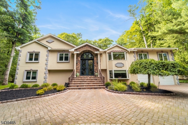 Beautifully updated custom home built in 2007 offering over 5,700 sq ft of living space in one of Old Tappan's most desirable neighborhoods. Featuring4 bedrooms, 3 full and 1 half baths, low taxes, soaring two-story entry foyer, 3 fireplaces, spacious family and game rooms, and a stunning newkitchen with large center island and French doors leading to an oversized deck. The finished lower level includes a junior suite, recreation room, gym,sauna, wine cellar, home office, and additional family room space. Private backyard with swimming pool creates the perfect setting for summer fun,relaxation, and entertaining. Located near top-rated Blue Ribbon schools, parks, shopping, dining, and convenient NYC transportation. A rareopportunity to enjoy luxury living in the heart of Northern Valley