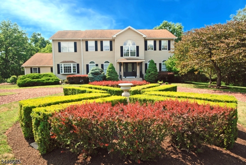This Impressive 4 Bedroom 2.5 Bath Center Hall Colonial Offers 3,512 (Approx) Square Feet Of Meticulously Maintained Living Space On Just Under 5 ACRES! Only One Acre That Needs Mowing, The Rest Backs To Woods!  The Inviting Main Level Features Rich Hardwood Floors That Flow Effortlessly From The Grand Foyer (Tiled) Into The Formal Living Room And Dining Areas. 2 GAS Fireplaces For Your Easy Convenience.  Office On First Floor.  At The Heart Of The Home Is A Chef Inspired Kitchen Boasting Elegant Granite Countertops,  And A Sunlit Breakfast Area. Upstairs The Expansive Layout Includes A Private Primary Suite And Three Generous Bedrooms With Ample Closet Space. Complete With A 3-Car Garage And A Beautifully Landscaped Yard, Trek Deck And Patio, This Home Offers Modern Luxury Packaged In A Classic Design.  FINISHED BASEMENT With Personal Gym (Equipment Included)! Bonus Room In Basement Ideal For A Secondary Office Or Playroom. Route 22 Side Of Readington Township This Home Is In A Perfect LOCATION For Get Aways To The NJ Shore, Wegman's, Shoprite, Mall, Restaurants.  A MUST SEE HOME!  Fireplace & Chimney Are Being Sold "As Is" No Known Issues. Home Also Equipped With Alarm System With Police & Fire.