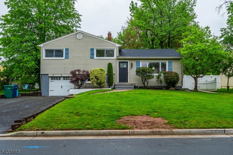 Nestled on a quiet street in the heart of Fanwood, this beautifully renovated split-level home offers the perfect blend of modern updates, comfortable living, and commuter convenience. Fully updated in 2025, the home features bright, open living spaces filled with natural light and a seamless flow designed for today's lifestyle. The renovated kitchen is the centerpiece of the home with custom cabinetry, stainless steel appliances, durable countertops, a center island, and direct access to the backyard patio   ideal for entertaining or everyday living. Upstairs offers 3 comfortable bedrooms and an updated full bath, while the lower level includes a spacious family room and second full bathroom for flexible living options. The finished basement provides additional living space with a den, office, and laundry area. Outside, enjoy a private fenced backyard with a brand-new patio perfect for relaxing, gatherings, pets, or summer evenings. Additional 2025 updates include the kitchen, bathrooms, roof, patio, and major interior improvements, making this a true move-in-ready opportunity. Conveniently located near parks, shopping, restaurants, downtown Fanwood, and approximately a half mile to NJ Transit service to NYC.