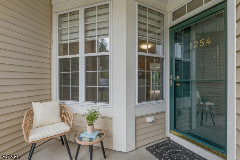Lovingly maintained by its original owner, this spacious townhome spans three levels and offers the perfect blend of comfort, convenience, and potential. Move right in and enjoy the peace of mind that comes with updated mechanicals, leaving you free to invest in the fun stuff over time.The main level features an eat-in kitchen with a breakfast nook, a powder room, and an open-concept living and dining area with a two-sided gas fireplace. Sliding glass doors lead to a private deck, perfect for morning coffee or winding down at the end of the day.Upstairs, you'll find a sunlit primary suite with vaulted ceilings, a large walk-in closet, and a private bath. Two additional generously sized bedrooms, a full hall bath, and second-floor laundry offer plenty of space and functionality.The unfinished walk-out basement opens to a second private outdoor area and provides an incredible opportunity to expand your living space. Whether you envision a large family room, home gym, office, or guest suite, the possibilities are endless.Located in a serene community with fantastic amenities, including a pool, sand volleyball court, playground, and clubhouse, and just minutes from shopping, dining, and major highways. This is a well-maintained home you can live in now and update at your own pace, an incredible opportunity to make it your own.