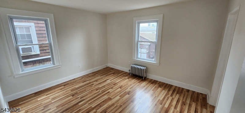First floor apartment with a one way street: 2 bedrooms, 1 bathroom, eat-in kitchen, dining room, living room with a working fireplace. Kitchen : stove, refrigerator and stainless steel microwave. Closets throughout the apartment. No pets, off-street parking, and no laundry at the promises. Walking distance to Park Elementary School and Branch Brook Park.