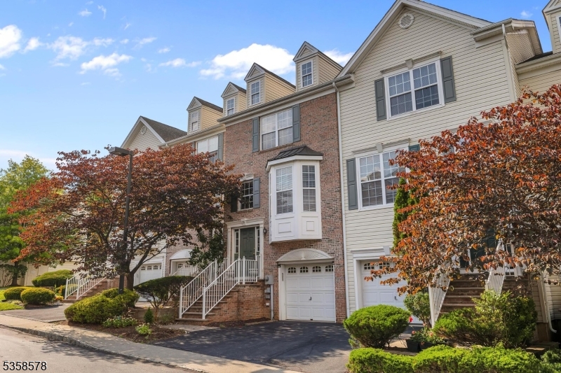 Beautifully maintained unit features eat-in kitchen with under cabinet lighting, refrigerator with ice-maker and water line, hardwood floors and black appliances. Living room and dining room combination with wall to wall carpeting, 1st floor powder room. Second floor features primary suite with tray ceiling and walk-in closet, full bath with tub-shower, second bedroom with double closet and full bath, also accessible from hall. Laundry located on second floor! Finished walk-out basement with high ceilings and recessed lighting offers powder room and family room with gas fireplace and sliders to patio in fenced backyard. AC and furnace 2017; security system (land line required), 1 car garage with opener and more! Nice community with amenities.
