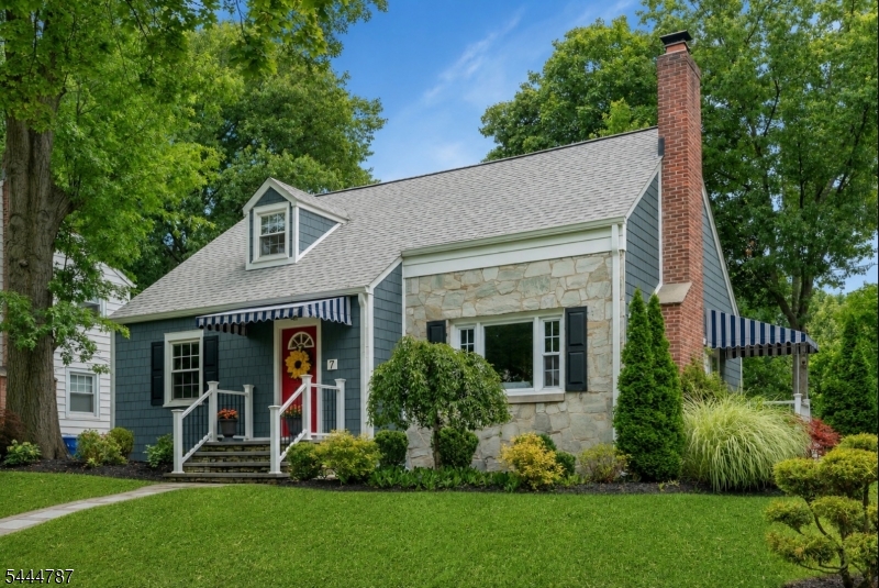 Welcome to 7 Hawthorne Ave, charming Cape Cod on a desirable corner lot in Glen Ridge, thoughtfully updated over the past two years, this exceptional home blends timeless character with modern comfort. The open-concept kitchen features premium countertops, stainless steel appliances, abundant cabinetry, and soft-close drawers, flowing seamlessly into the inviting living room with a cozy gas fireplace. The expanded dining room is perfect for everyday living and entertaining. A rare first-floor primary suite offers a king-sized bedroom, renovated en-suite bath w/a spacious walk-in shower, dedicated laundry room, powder room, and direct access to the attached garage. Upstairs are 3 generously sized bedrooms & an updated full bath. The finished basement provides flexible space for recreation, home office, gym, or media room. Recent improvements include a new roof, James Hardie siding, gutters, furnace, water heater, windows, doors, upgraded electrical service, Wi-Fi-controlled attic fans & a whole-house water filtration system. Outside, enjoy a private fenced backyard with a patio, mature landscaping, & an in-ground sprinkler system. Ideally located near top-rated schools, parks, shopping, dining, vibrant Montclair & NYC transportation. This move-in-ready home offers the perfect blend charm & modern living.