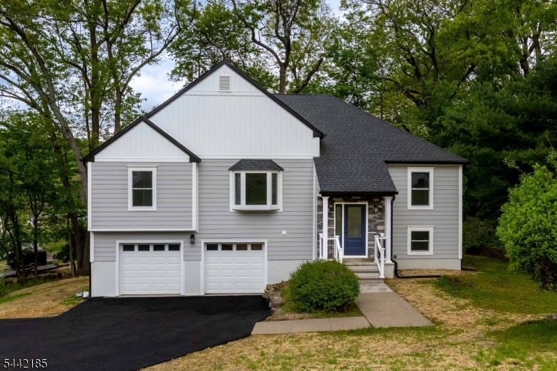 Extensively renovated and move-in ready! This beautifully updated home offers modern finishes, expanded living space, and quality craftsmanship throughout. Featuring 3 bedrooms and 3 full bathrooms, the home has been thoughtfully upgraded to combine style, comfort, and functionality. The updated kitchen features a newly added breakfast bar and brand-new stainless-steel appliances, making it perfect for both everyday living and entertaining. The finished ground floor adds valuable living space and includes a spacious family room, private office, and full bathroom - ideal for guests, remote work, or extended living needs. Recent upgrades include: Hardie Plank siding, New roof, New windows, Brand-new deck, Stone front entrance for enhanced curb appeal, New driveway and a Newly finished garage. This home offers the perfect blend of modern updates and flexible living space; all designed for today's lifestyle.