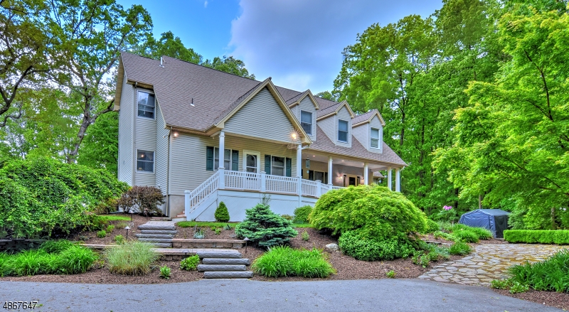 This tranquil, private country retreat nestled on over 3 acres is truly like no other. This thoughtfully designed, custom 4bd 3 bath home features scenic views from every vista. Enjoy the well-sized, light filled rooms + open concept design. Rocking chair porch w/ main entrance greets guests + 2nd entrance leads to lndry, bd/office, full bth + wlk-thru pantry to kitchen. Enjoy the ambiance of a gas fireplace in the eat-in kitchen w/ custom hickory cabs + granite counters. Living room w/ picture window + cathedral ceilings off dining room. First flr master en-suite w/ walk-in closet, water closet + soaking tub. Upstairs has a bonus room, sitting area & two lrg bds w/ Jack + Jill bth. Basement entertainment room w/dry bar + sur. sound. Unfinished area has lrg. workshop + dbl. door access.