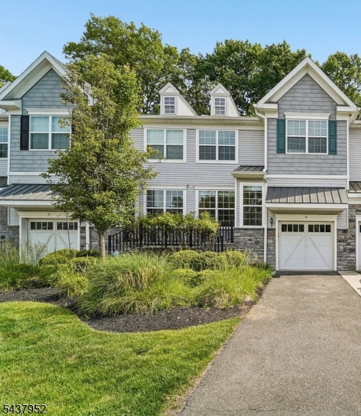 Welcome to one of Bergen's premier townhome communities; Farm Estates. This three bedroom, two full, two half bath renovated home is brimming with space. The open concept floor plan boasts living and dining rooms which step right out to the stone patio and backyard oasis. The updated kitchen includes a breakfast bar at the large granite center island, new appliances, and custom cabinetry and lighting. Up the stairs, you will find a primary suite complete with an attached flex space perfect for a sitting room or office, multiple walk in closets and a spa bathroom. Two additional bedrooms, a full bath, and laundry room round out the second floor. A grand, newly finished basement with high ceilings and a half bath provide another floor of living and recreation space. With its large floorplan, generous storage space throughout, an attached garage, the longest driveway in the neighborhood plus ample guest parking, location near transportation, schools, and shopping, 24 Pineview genuinely offers the utmost in convenience and luxury.