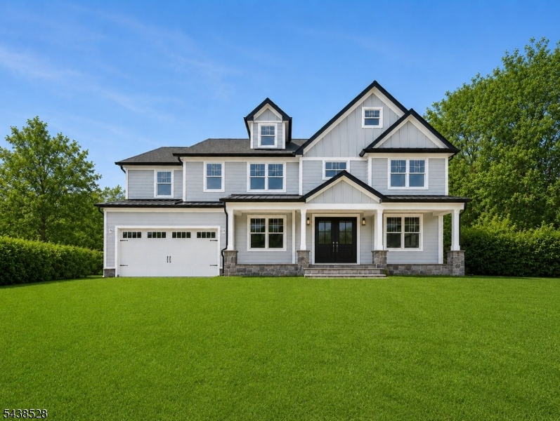 Experience luxury new construction at its finest in this exceptional custom residence offering approximately 5,862 square ft of finished living space across four beautifully designed levels. Featuring 6 bed and 6.1 bath, this home seamlessly blends timeless architecture,modern design,and superior craftsmanship.The open-concept floor plan is anchored by a stunning chef's kit complete w/custom soft-close cabinetry,a two-tier center island,premium ss appl,designer backsplash,and walk-in pantry. The kit flows effortlessly into the spacious FR  featuring a 42  gas fp with a quartz surround and double mantle.A first-floor guest suite provides flexibility for visitors or in-law suite, while the luxurious primary suite offers a tray ceiling, oversized custom walk-in closet, and spa-inspired bath with a freestanding soaking tub and glass-enclosed shower.The fully finished lower level includes a custom wet bar, recreation room, bonus room with closet and full bath, ideal for a gym, office, media room, or guest suite. Additional highlights include: oak hardwood floors, CAT-6 wiring, soundproofed laundry and bath areas, multi-zone York HVAC, mudroom with custom built-ins, and second-floor laundry.Outside, enjoy Hardie Plank siding, AZEK trim, Andersen windows, a bluestone porch, covered rear deck, expansive paver patio, gas BBQ connection, professional landscaping, irrigation system - all in a desirable Westfield location close to downtown, parks, dining, shopping, and transportation.
