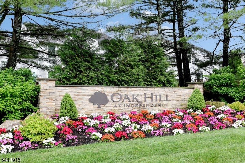 Welcome to Oak Hill, where comfort, convenience, and community come together in this beautifully maintained 2 bedroom, 1.5 bath townhome. Filled with natural light, stylish vinyl flooring, and functional layout, the main level offers bright and airy living. Step outside to your private deck with dedicated BBQ space, ideal for summer gatherings or peaceful mornings. Upstairs, you'll find a spacious primary bedroom with walk in closet, along with a generously sized secondary bedroom. A full bathroom conveniently serves both bedrooms, creating a practical and comfortable second floor retreat. The finished basement provides valuable additional living space, ideal for a recreation room, home gym, or work from home setup. An attached garage offers convenience, storage, and protection from the elements.Enjoy an exceptional lifestyle with access to a clubhouse, multiple recreation courts, playgrounds, and beautifully maintained common areas. Ideally situated near the vibrant downtown Hackettstown business district, you'll enjoy easy access to local restaurants, shops, and community events. Commuters will appreciate proximity to major highways, while outdoor enthusiasts can explore nearby scenic trails, parks, and natural attractions.Whether you're searching for your first home, looking to downsize, or simply seeking low maintenance living with outstanding amenities, this move in ready townhome offers the perfect opportunity to enjoy all that Oak Hill has to offer.