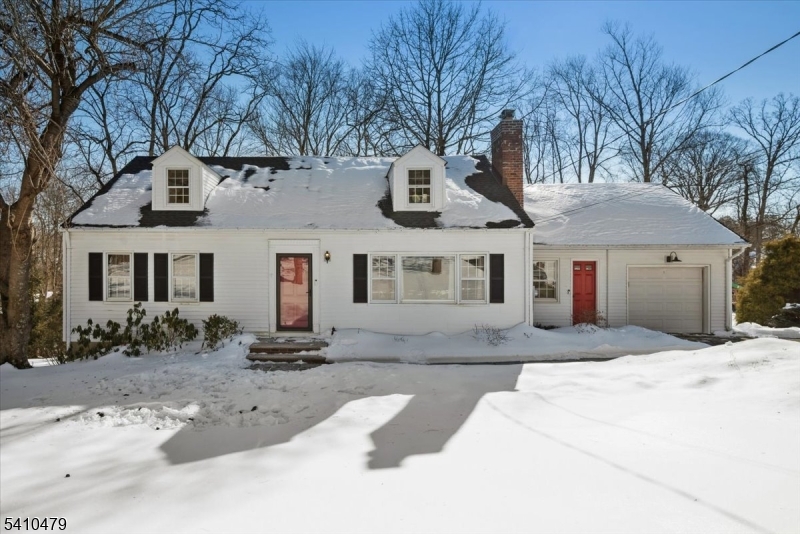 Recently Renovated & Superbly Located! Move right into this expanded and beautifully updated Cape Cod with 4 bed, 2 baths, and an attached one-car garage. Set on a half-acre lot on a tree-lined street in the highly desirable Butterworth Farms neighborhood of Morris Township, this home is close to schools, parks, dining, shopping, and NJ Direct train to NYC. Distinctive features include hardwood floors, crown molding, a fireplace, skylights, a partially finished basement, and a deck overlooking the sweeping back yard. The home's main entrance opens to a bright, airy living room with a wood-burning fireplace, a formal dining area, and a newly updated kitchen outfitted with quartz counters, SS appliances, and fresh white cabinetry. Off the kitchen is a sunny family room with sliding glass doors to the deck and its own outside entrance from the front making it ideal for a home office setup. The primary bedroom, full bathroom, and a second bedroom complete the main level. Two more bedrooms upstairs include skylights and dormer windows, along with a full hall bathroom. The partially finished walkout basement is perfect for entertaining with a large recreation room and an exercise room. This home offers a peacefully situated haven in a sought-after community just minutes from the vibrant heart of downtown Morristown. Truly turnkey and move-in ready, it provides the perfect balance of comfort, convenience, and lifestyle, an ideal place to settle in and feel right at home.