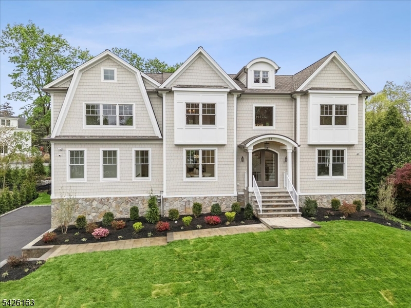 Discover extraordinary new construction crafted by an award winning builder known for timeless design and exceptional attention to detail. The home features 7 bedrooms, 7 full and 1 half baths, and three expansive levels of luxurious living space tailored for today's modern lifestyle. The thoughtfully designed first floor offers a classic layout with a private bedroom/In Law suite/office, spacious mudroom, and separate appliance pantry. The finished lower level is ideal for entertaining and everyday living, featuring a wellness room, recreation area, additional bedroom, and kitchenette. Premium features include white oak flooring, designer finishes, custom cabinetry, top-tier appliances, full house generator, and countless sophisticated upgrades throughout. Perfectly situated on a picturesque tree-lined street in the prestigious town of Madison, this exceptional home offers convenient access to top schools, NJ Transit and direct service to New York City.
