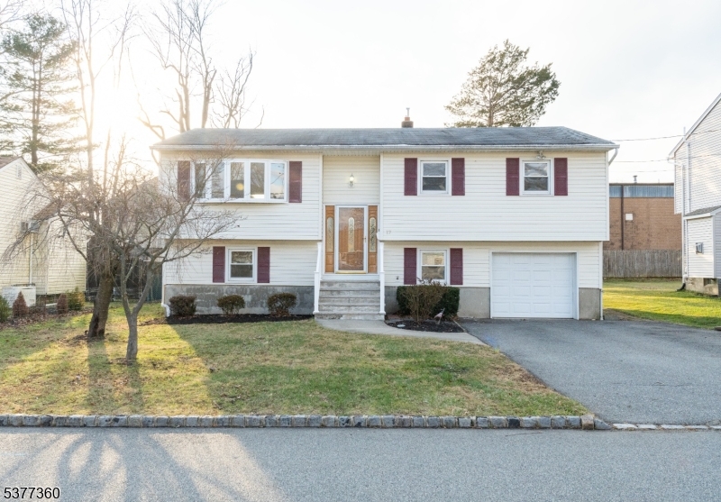 This special home with two nicely finished levels is perfect for those seeking to live in a nice neighborhood near parks, shopping, and commuter routes. The upper level has a spacious living room open to a formal dining room, an updated kitchen with granite counters and stainless appliances, three bedrooms and full bath. The lower level has a bedroom, full bath, office/home study area, laundry room, and family room with walkout to the backyard. Instant hot water is an added bonus. The flat and fenced backyard has a patio with space for outdoor furniture and barbeque grill. Within a few blocks are lakeside sitting benches and an optional membership for beach and fishing access. Also nearby is Lake Parsippany Park with playground, basketball court, and ball field. Convenient to routes 202, 10, 46, 287, and 80. Credit and income verification required, tenant responsible for first $100 of each repair.