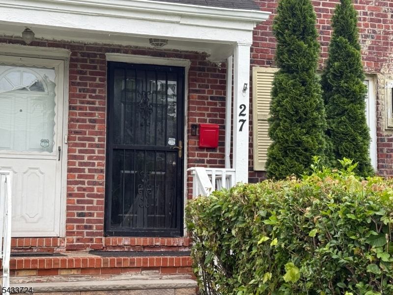 Welcome to this beautiful 2-bedroom, 1-bath home located on a quiet, tree-lined street in East Orange. Updated in 2023, this charming residence offers modern living with comfort and convenience.  Step inside to an inviting open-concept layout featuring a spacious eat-in kitchen and living area, perfect for everyday living and entertaining. The kitchen is equipped with quality modern appliances, including a 5 burner stove with built-in air fryer functionality, microwave, LG washer & dryer.  Additional highlights include an enclosed rear porch ideal for extra storage, as well as a full basement offering ample space for storage, recreation, or future possibilities. Enjoy outdoor living in the private backyard, perfect for relaxing or entertaining guests. Parking is convenient with two dedicated spaces and additional room for another vehicle.  Ideally situated for commuters, this home is centrally located near major transportation routes, including Routes 280 and the Garden State Parkway. NJ Transit train stations, New York-bound train and bus lines, and multiple local bus routes are all just minutes away, providing easy access to New York City and surrounding areas.  The property is also conveniently located near schools, houses of worship, shopping, dining, and other local amenities.    A wonderful opportunity for buyers seeking value, convenience, and the chance to be part of East Orange's ongoing revitalization.