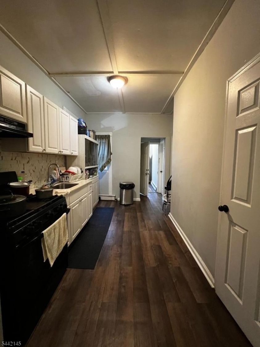 Spacious two-family home offering 6 bedrooms and 3 full bathrooms, plus a finished attic and finished basement for additional living space. Great opportunity for both investors and owner-occupants. The property features modern kitchens, updated bathrooms, separate utilities, and a fenced backyard for added privacy. Conveniently located near major highways, shopping, and public transportation. Motivated seller bring all offers!