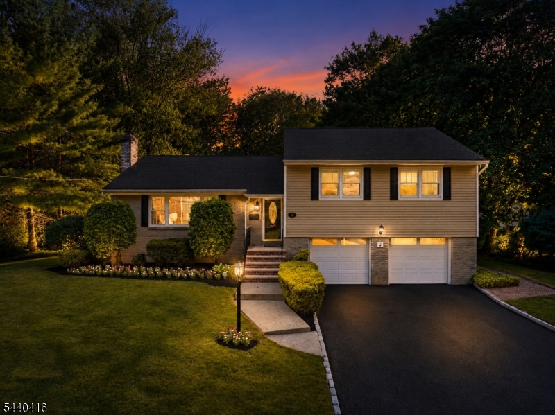 Beautifully maintained and surprisingly spacious, this 4-bedroom, 3-full-bath home offers the perfect blend of comfort, thoughtful updates, and an exceptional location. A dramatic two-story foyer welcomes you into bright, sun-filled interiors featuring multiple living spaces and a flexible floor plan designed for today's lifestyle. The open kitchen flows seamlessly into the dining room, creating an ideal setting for everyday living and entertaining. All three bathrooms have been tastefully updated, with two full-bath renovations completed in 2022. A desirable ground-floor bedroom and full bath providing excellent flexibility as a bedroom or a home office. The fully finished basement, completed in 2019, adds valuable living space for recreation, fitness, media, or play. Recent improvements throughout the home provide peace of mind and modern convenience, including a dishwasher (2023), microwave (2024), washer (2024), and dryer (2024). An EV charging station, installed in 2024, adds another thoughtful upgrade for today's homeowner. Step outside to enjoy a spacious deck overlooking a large, private backyard?perfect for entertaining and relaxing amidst mature landscaping. Ideally situated just steps from the New Providence Train Station with direct NJ Transit service to New York City and Hoboken, and within blocks from the elementary school, parks, downtown shops, and restaurants, this home offers a superb location and an unmatched lifestyle.