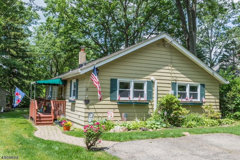 INDIAN LAKE! This renovated lake front home is beautiful. Open Floor Plan. Huge deck over looking the lake. Walk to Club House.