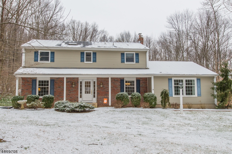 An updated Cherry kitchen, finished basement and an in-ground pool highlight all this move-in ready colonial has to offer. Situated on 2 picturesque ac at the end of a cul de sac this home boasts a distinctive 1st flr layout, generously sized rooms, kitchen with endless cabinet space and stainless appliances, wood floors, brick fplc, recessed lighting. Master BR has attached full bath with skylight, walk-in closet. Party-perfect entertaining-sized deck with retractable awning overlooks private backyard and in-ground pool with stay-cool concrete surround. Nicely landscaped with brick walkways, perennials, electric fence, garden shed, covered front porch, oversized 2c garage. Located apprx 2 mi to Rte 206. Close to Chester & Flanders shopping, restaurants, hiking/biking trails and many pick-your-own farms.