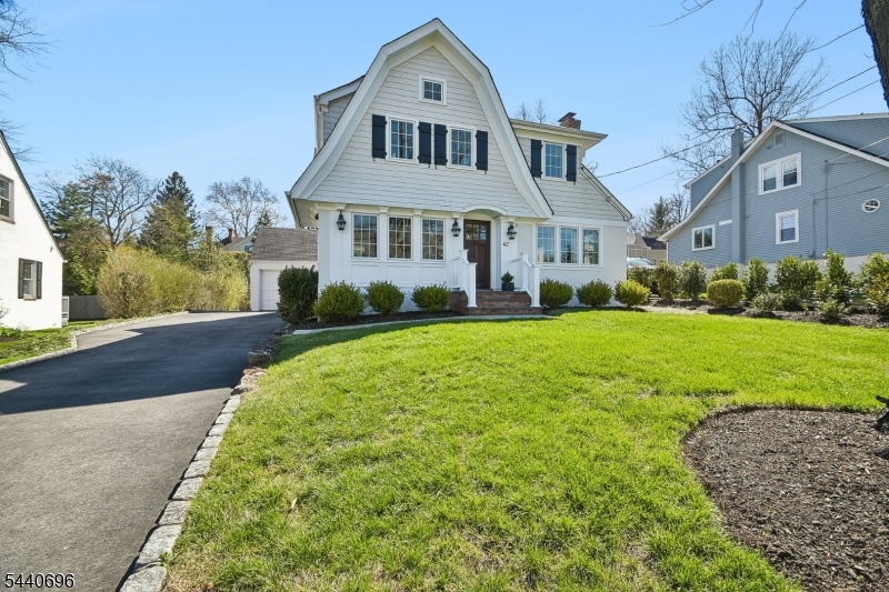Move right into this beautifully renovated Colonial just minutes from downtown Summit, the Midtown Direct train to NYC, and Summit's highly regarded schools.  Extensively renovated in 2017, the home was thoughtfully updated to enhance both style and functionality while preserving its timeless character. Renovations included a new kitchen and bath, mudroom, maple flooring throughout, all new windows, a new roof, and updated HVAC and electrical systems. Elegant millwork throughout the home adds architectural charm and refined detail. The home offers a flexible layout with four bedrooms and two full baths, including a first-floor bedroom ideal for a home office or guest room, along with a full bath on the main level. Upstairs, three additional bedrooms include a light-filled primary featuring high ceilings and custom windows. A convenient second-floor laundry adds everyday ease. A large basement provides additional living and recreation space along with generous storage. Set on a .17-acre lot, the backyard is ideal for entertaining with a comfortable sense of privacy and easy maintenance, perfect for outdoor dining and relaxed evenings. Just minutes from parks and trails, including Reeves-Reed Arboretum, as well as several renowned golf courses and country clubs.