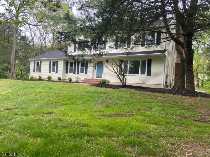4 Bedroom 2 1/2 bath Colonial, Wooded Lot with Deck. Hardwood floors throughout. Fireplace. Central Vacuum System not working. Pictures are from 2022. Kitchen Photos 2025.