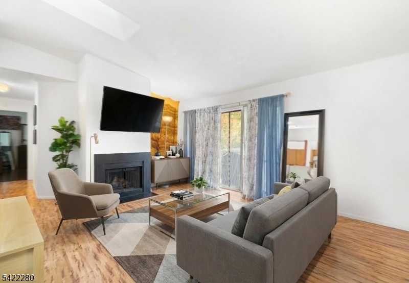 Step into this beautifully maintained 3rd-floor, level condo in the desirable Society Hill community, where comfort and convenience come together effortlessly. As you enter, you're welcomed by a bright and inviting open-concept living and dining area, perfect for both relaxing evenings and entertaining guests, featuring a cozy woodburning fireplace as its focal point and sliding doors that lead to a private balcony an ideal spot to enjoy your morning coffee or unwind at the end of the day. The home offers laminate flooring throughout for a clean, modern look with easy maintenance, while the kitchen is equipped with classic wooden cabinetry that provides ample storage and functionality for everyday living. This thoughtfully designed layout includes two generously sized bedrooms, including a primary suite with its own full bath, along with a second full bathroom both featuring tubs for added comfort and versatility. An in-unit laundry area adds convenience to daily routines, and residents of Society Hill enjoy access to amenities such as a clubhouse, outdoor pool, playground, and tennis courts, making this well-kept condo a perfect blend of comfort, practicality, and community living.  Condo is being sold as is.