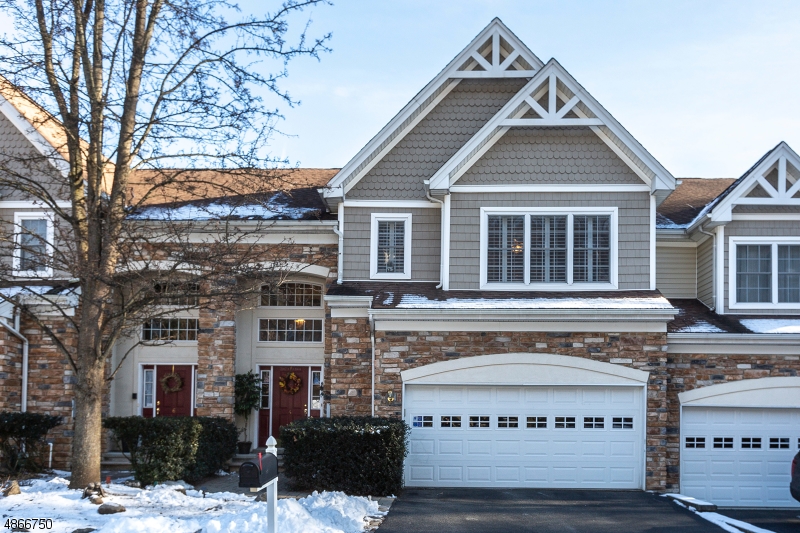 Location, location, location certainly applies to this magical townhome as well as the phrase exceptional, exceptional, exceptional.  Pride of ownership is overflowing in this wonderful home located on a cul de sac street in the sought after Ramapo River Reserve.  The 2-story foyer w/hardwood floors & powder room leads you into a spacious great room w/fireplace & formal dining room w/deck access so you can enjoy the stunning views of the Ramapo Mountains.  The gourmet kitchen has rare garage access & a spacious eating area.  Relax in the large master bedroom w/inviting master bath.  Your guests will enjoy their bedroom w/ensuite bath.  The lower level offers a finished walkout family room w/12 ft ceilings, powder room & plenty of storage.   Newer furnace, a/c & hot water heater.  You'll be impressed!