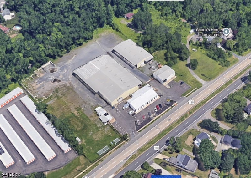 Positioned along one of Central New Jersey's most heavily trafficked commercial corridors, this 6.82-acre Flex / Industrial / Retail property presents a rare opportunity for both tenants and investors to secure a highly functional, flexible and strategically located asset. With over 42,000 square feet of existing improvements across four buildings, the property is ideally suited for a wide range of users seeking visibility, accessibility and operational efficiency. Tenants will benefit from immediate highway exposure along Route 130, strong daily traffic counts exceeding 30,000 vehicles, multiple access points for seamless ingress and egress and a layout that supports a variety of uses including contractor operations, distribution, light manufacturing, retail showroom or self-storage. The combination of clear-span industrial space, drive-in loading, ample parking and outdoor yard area creates an ideal environment for businesses that require both functionality and visibility in a growing and accessible market. NOTE: 2 parcels included in sale: 22 Route 130 (4.85 acres) and 18 Route 130 (1.97 acres). Also available for Lease at $14/sf.