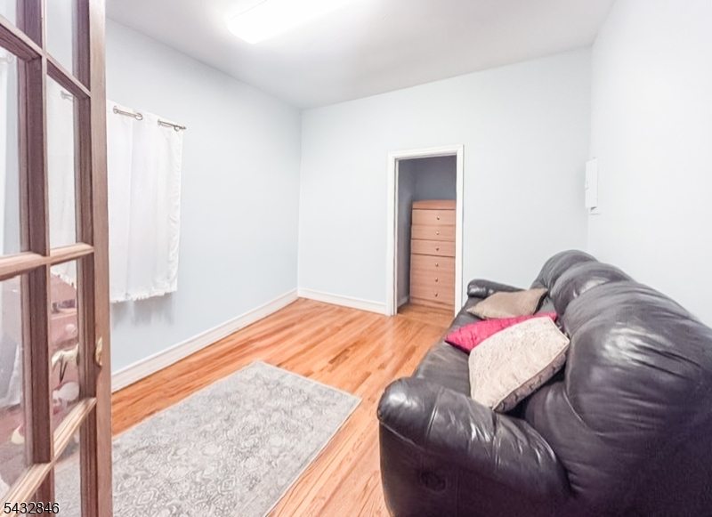 Calling all Investors, First time home owners, Owner Occupied to come view this corner property in the heart of the Ironbound.  Legal 3 family with 4 bedroom in two units and 3 bedrooms in first floor unit. LR and Kitchen in each unit with a finished basement w/ full bath.  Coin laundry in basement for extra income.   Detached Garage and Driveway Parking.  Don't miss this income producing property.