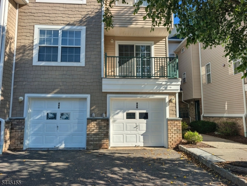 Two-bedroom, 2.5-bath townhome in the highly sought-after Pike Run Woods, backing to trees for added privacy. Both bedrooms are filled with natural light. The main-level den is versatile enough to work as a home office or a third bedroom. The updated kitchen features white cabinetry, quartz counters, and stainless steel appliances, opening through a pass-through window to the living room, which has its own private balcony. The primary suite includes a walk-in closet, an en-suite full bath, and a private balcony of its own. A second full bath serves the second bedroom. The unfinished basement offers flexible storage or workout space with natural light from two windows, and a one-car attached garage adds convenience. New HVAC in 2023. Enjoy resort-style amenities including a clubhouse, pool, tennis courts, playground, and more, all in the top-rated Montgomery school district, just minutes from shopping, dining, and local parks.