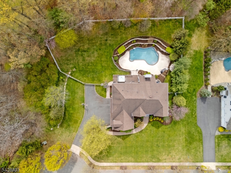 Discover luxury living in this grand colonial on .9 acres situated at the end of a quiet cul-de-sac.This home boasts true pride of ownership & checks all of today's buyers' desires. This dreamy home features a dramatic 2-story foyer & a spacious open floor plan ideal for entertaining.The newly renovated & gorgeous kitchen is complete w marble backsplash, quartz ctops, butler's pantry, food pantry & has sliders that lead to your own private oasis; deck w hot tub & entrance to in ground pool surrounded by lush professionally landscaped grounds.The kitchen flows seamlessly to dining area & family room w gas fireplace & vaulted ceiling - all enhanced by hardwood floors & elegant moldings.1st floor also features formal living & dining rooms adorned with moldings, home office, large powder room & mud room. Bonus: This home has been thoughtfully refreshed with a full interior & exterior painting, creating a clean, modern feel throughout. Bathrooms have also been upgraded w brand-new vanities, adding style & functionality. 2nd level boasts expansive primary suite w huge luxury bath, 3 walk-in closets plus an add'l closet & a versatile sitting rm perfect for dressing area  or flex space. 3 other bedrooms, main bath & convenient 2nd floor laundry rm w access to a walk-up attic add to the home's functionality. A partially finished basement w access to outside provides additional living space for recreation/storage. Pool cover & equipment included. MULTIPLE OFFERS RECEIVED